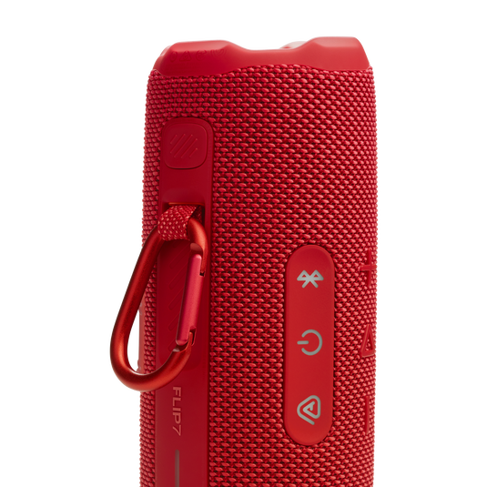 https://admins.lenoholding.lv/storage/media/21285/JBL_FLIP_7_DETAIL_CLIP_RED_168_x1.webp